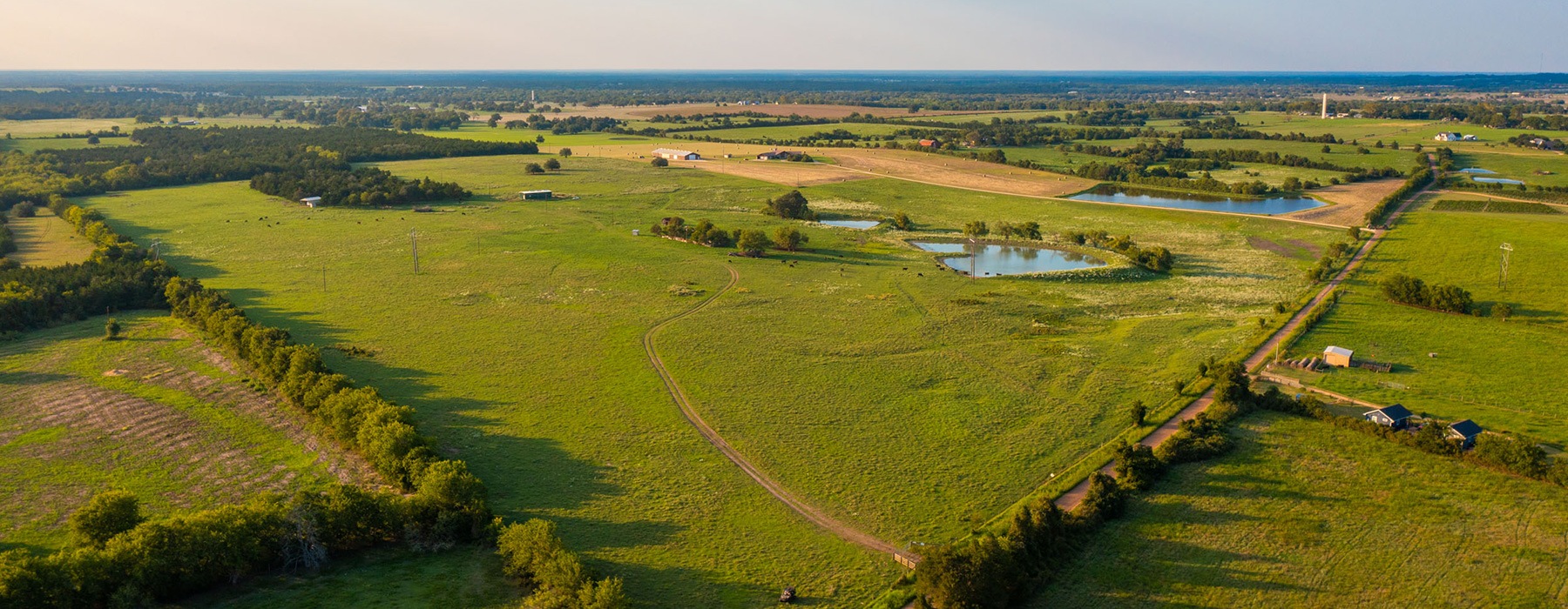 aerial of green landscaping and farms